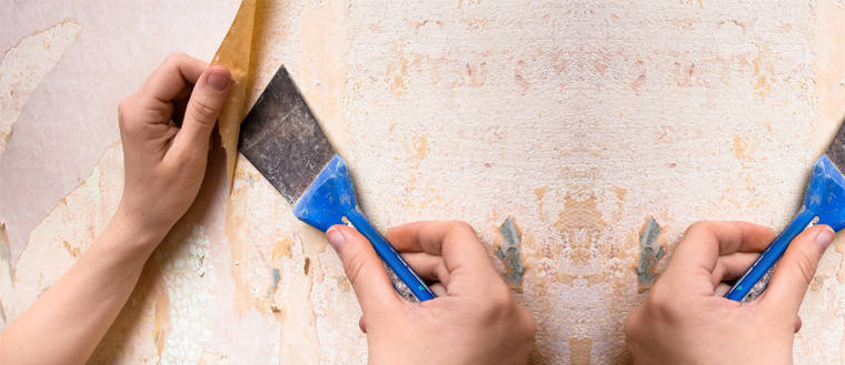 Adhesive Wallpaper Glue Applying Using Roller Close Up Photo. Worker  Installing New Modern Vinyl Wallpapers Stock Photo - Alamy